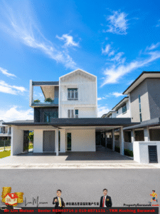 Modern two‑story house with white and gray exterior, glass balcony, and shaded ground-floor entry set against a bright blue sky.