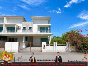 Modern white two‑story house with a gated driveway and flowering hedge on the right; bottom has a real estate advertisement banner.