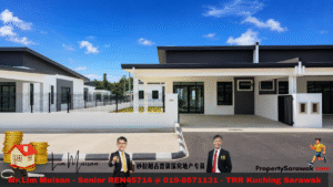 Wide shot of a modern housing development with white and gray facades, gates, and a bright blue sky; a promotional banner at the bottom shows two men in suits, a runner, and contact text.