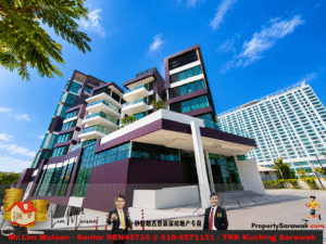 Contemporary purple-accented apartment building with glass balconies under a blue sky; ground-floor real estate ad banner visible at the front.