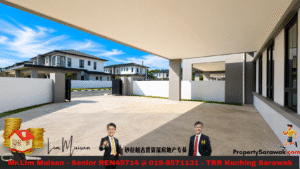 Modern residential complex courtyard under a wide beige canopy, with white/gray houses and a gated entrance against a blue sky.