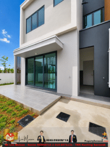 Modern two-story house exterior with large glass sliding doors and a tiled patio, gray and beige walls under a blue sky.