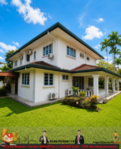 White two-story house with green roof, red-tiled accents, and multiple air conditioning units on the exterior, set in a sunny yard with potted plants and a manicured lawn.
