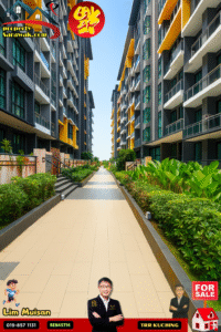 Wide central walkway between modern apartment buildings with yellow accents, greenery on both sides, and a red 'For Sale' sign in the foreground; property ad graphics.