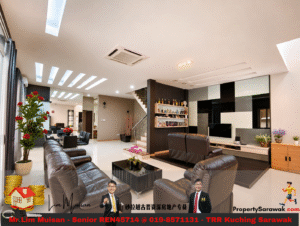 Spacious modern living room with brown leather sofas, glass coffee table, and a wall-mounted TV. A staircase and shelving with bottles are visible nearby.