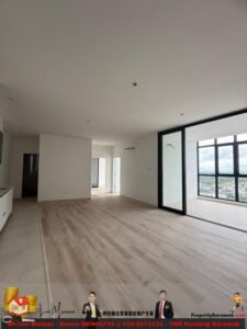 Spacious empty living area with light wood floors, white walls, and a large sliding glass door opening to a balcony with a city view.