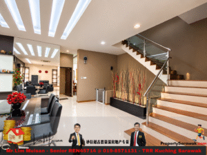 Open-concept living area with a staircase, glass railing, and modern decor; bright white tile floor and beige walls with red floral accents​