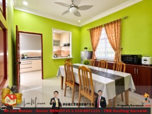 Bright lime-green dining room with a long table, six wooden chairs, and orange curtains; pass-through to a beige kitchen.