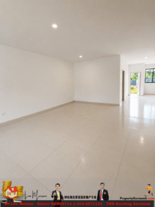 Bright, empty living room with white walls and large beige floor tiles, recessed ceiling lights, and a doorway leading to an outdoor area with a window.