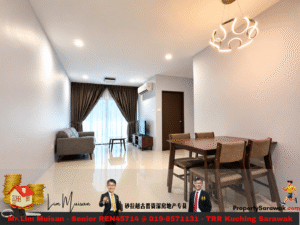 Bright living-dining room with gray walls, brown curtains over glass doors, gray sofa, coffee table, TV stand, and wooden dining table.