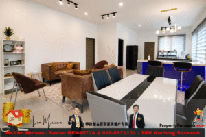 Open-plan living area with tan leather sofas, a white and black dining table, and a blue kitchen island with bar stools.