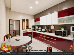 Modern kitchen with burgundy lower cabinets and white upper cabinets, grey tile backsplash, and a round marble table in the foreground with a vase of flowers and small bowls nearby.