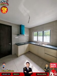 Modern L-shaped kitchen with beige cabinets, dark countertops, a blue range hood, and a large window showing greenery; property-for-sale overlays in corners.