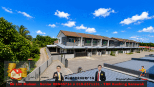 Row of modern two-story townhouses under a blue sky; an overlay banner advertises PropertySarawak.com and Mr Lim Muisan's contact details.