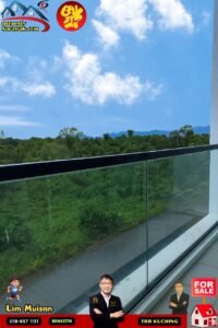 Balcony with glass railing overlooking dense green trees and distant hills; property ads and 'FOR SALE' graphic in the corners.