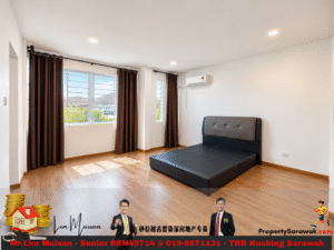 Modern bedroom with a low black platform bed and brown tufted headboard, large window with dark curtains, and wood flooring