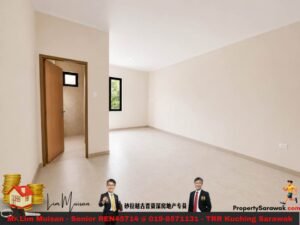 Empty beige-walled room with a wooden door open to a small bathroom, and a window letting in natural light. Clean, minimal space.