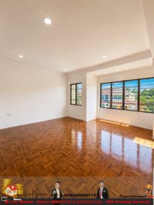 Bright empty living room with polished parquet floor and large windows letting in sunlight, white walls and recessed ceiling lights
