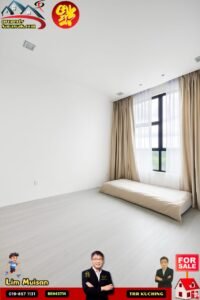 Bare bedroom with a low beige mattress on a pale floor, large window with sheer white and beige curtains, and sale banners overlaying the image.