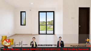 Bright empty room with a large black-framed sliding glass door to a yard, a slim side window, and a dark interior door on the right; a wide banner spans the bottom for ads.