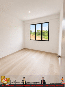 Unfurnished white-walled room with light wood laminate flooring and a large black-framed window showing green trees and blue sky outside, doorway on the right.