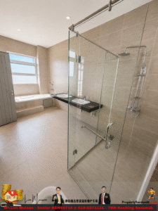 Modern bathroom with glass-enclosed shower, double sink vanity, and a bathtub near a window in beige tiled walls and floor.