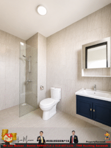 Minimalist bathroom with glass-walled shower, white toilet, and navy vanity with white sink.