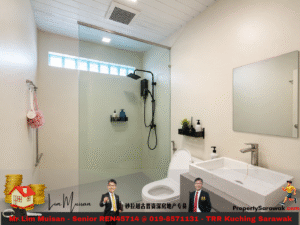 Contemporary bathroom with a glass-enclosed shower, black shower fixtures, and a marble sink with a large mirror above it.