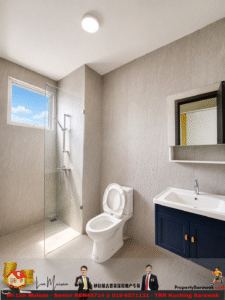 Modern bathroom with glass-walled shower, white toilet, and navy vanity under a large mirror; window shows blue sky outside.